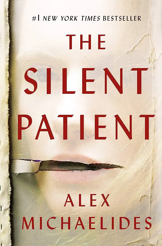 Cover image of The Silent Patient by Alex Michaelides featuring a torn canvas with a partially visible face in the background, conveying a mysterious and suspenseful atmosphere