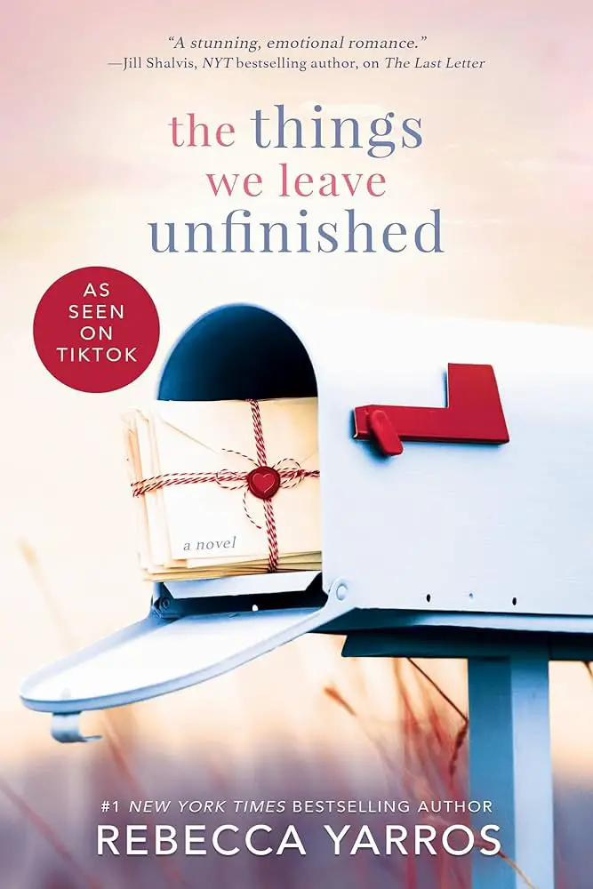 "Book cover of The Things We Leave Unfinished by Rebecca Yarros. An open white mailbox with letters tied in a red string, set against a pastel background, evoking a sense of emotion and anticipation."